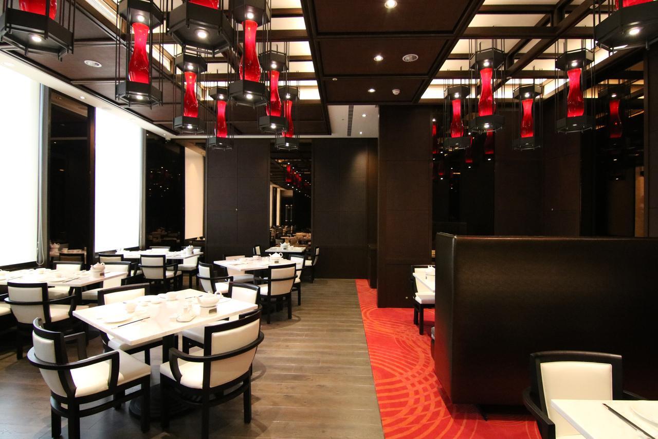 H2O Hotel Kaohsiung Exterior photo Interior of a restaurant in Hong Kong