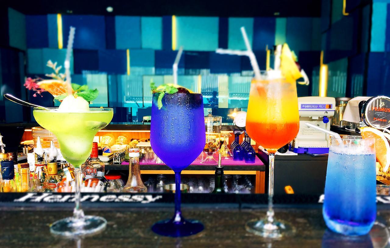 H2O Hotel Kaohsiung Exterior photo A selection of cocktails